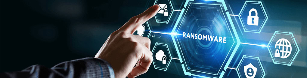 person tapping cybersecurity buttons next to ransomware button
