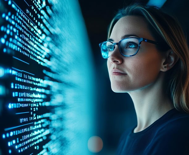 Female Data Analyst Reviewing Digital Code