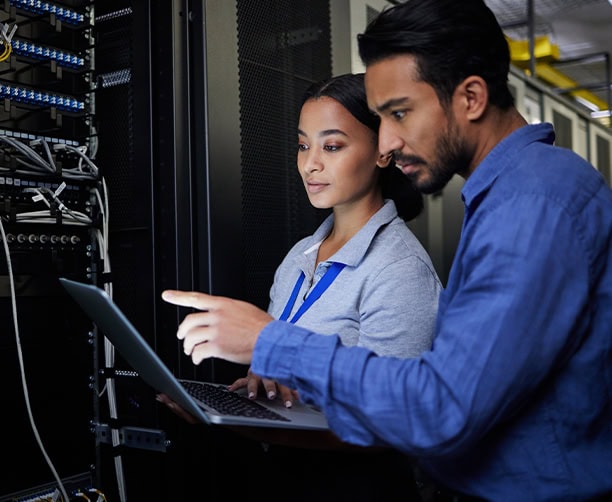 It Technicians Analyzing Server Room