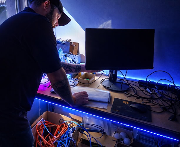 It Technician Working Computer Cables Desk Setup Network Wiring
